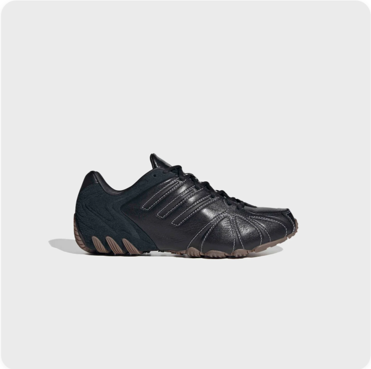 adidas Low-Top Sneakers – Black with Contrast Stitching & Sculpted Sole