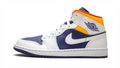 Air Jordan 1 Mid Sneakers – White & Navy with Orange Accents