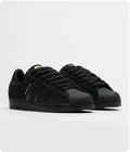 adidas Superstar Sneakers – Triple Black with Gold-Tone Branding