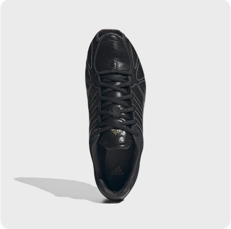 adidas Low-Top Sneakers – Black with Contrast Stitching & Sculpted Sole